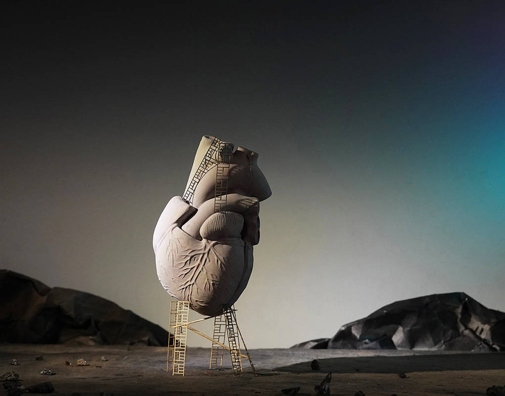 Surrealism, dream, heart, sculpted heart, concrete heart, landscape, scaffolding, twilight